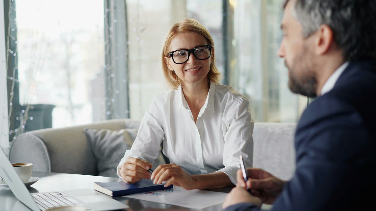 Property investor meeting with an adviser to talk through the negative gearing changes